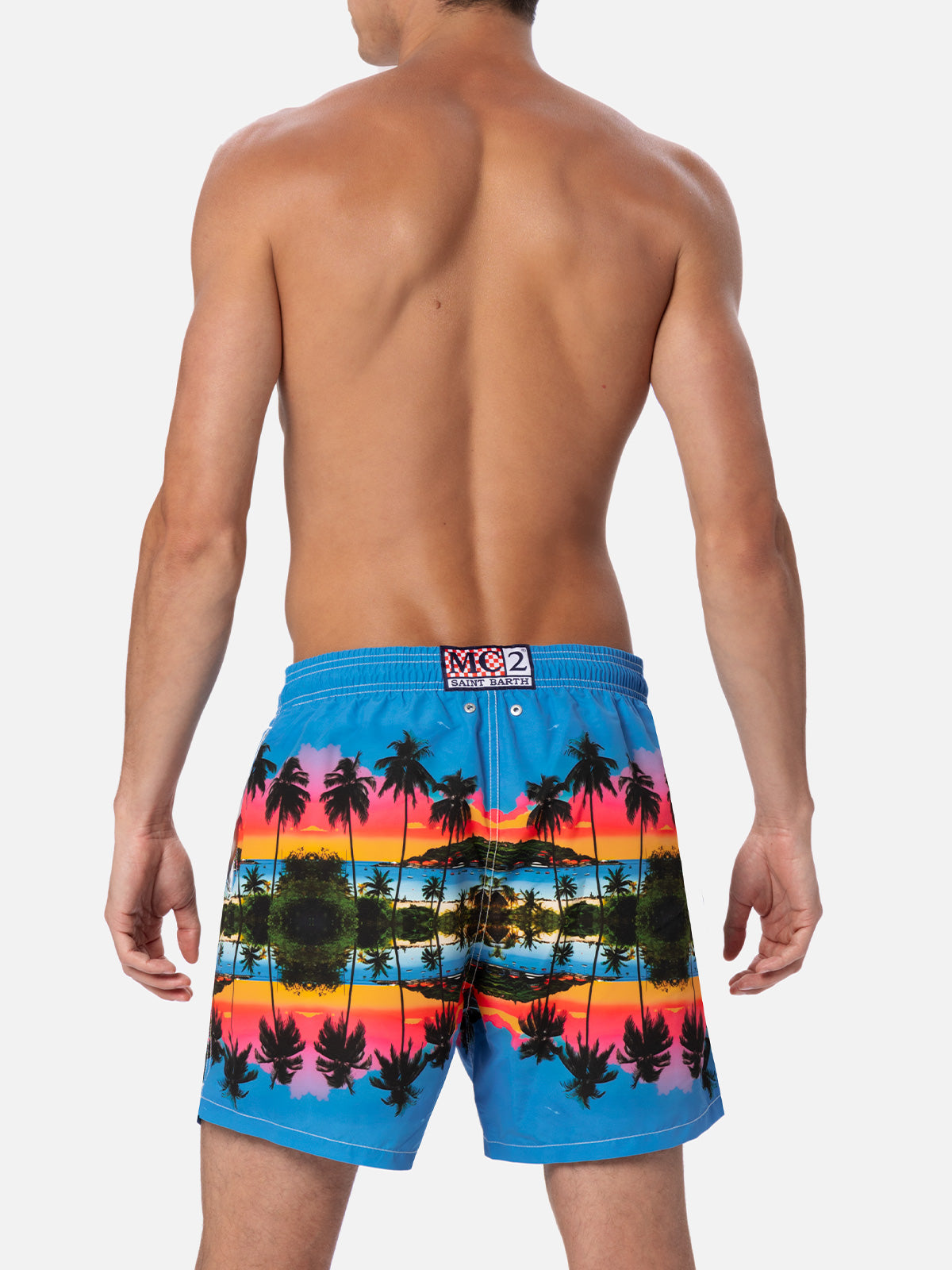 Man mid-length Gustavia swim-shorts with palms landscape placed print | AI CO-CREATED DESIGN BY RICKDICK - POWERED BY RED-EYE - MC2 Saint Barth