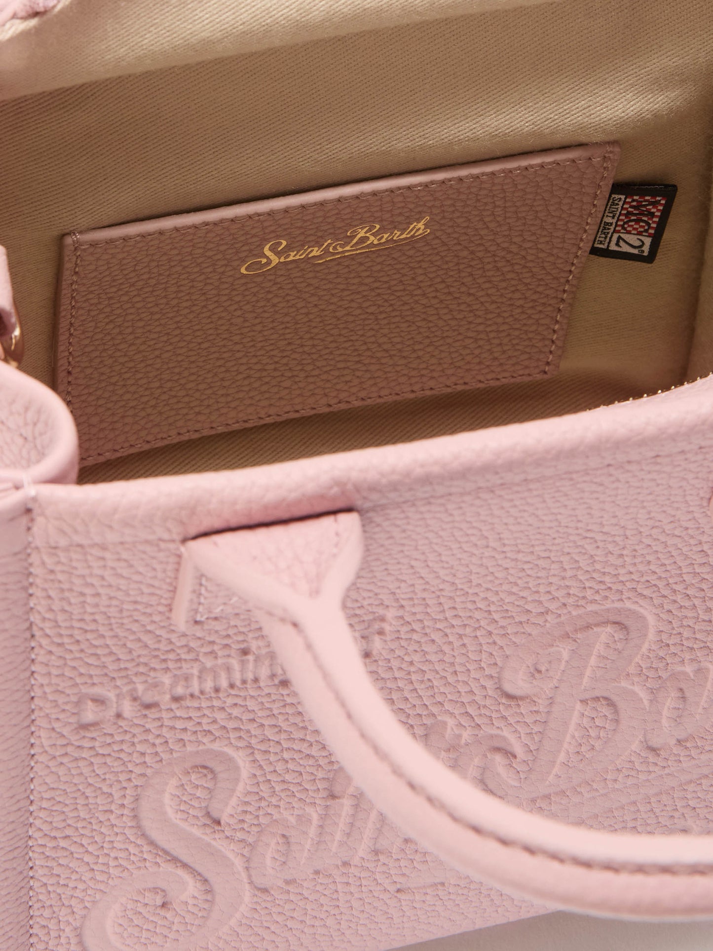 Mini bolso Vanity de piel rosa con textura granulada