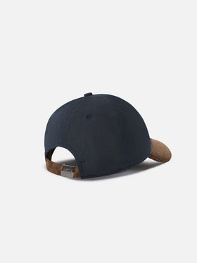 Marineblaue Kappe aus gewachstem Cord in blue Baseball mit Logostickerei 