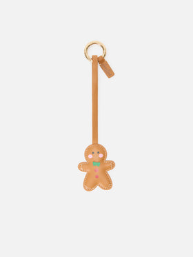 Brown leather bag charm with gingerbread man shape