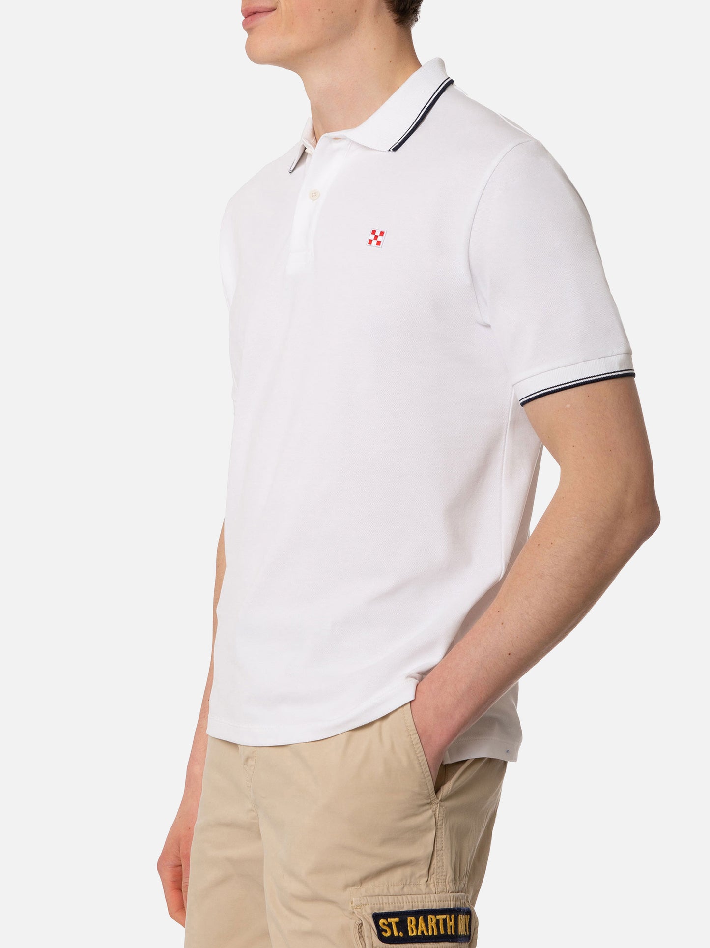 White piquet polo with St. Barth logo