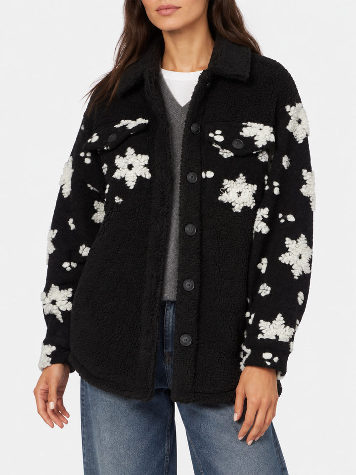Giacca Elys in sherpa nera con fantasia fiocchi di neve