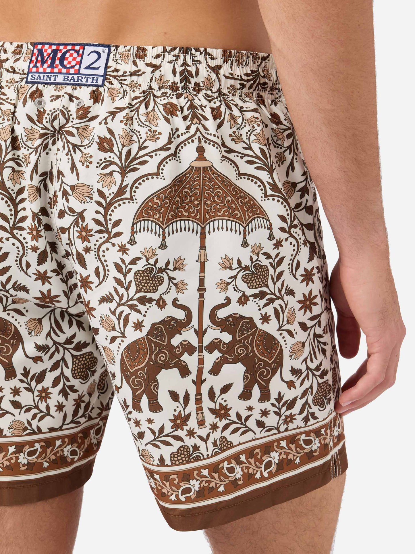 Gustavia swim shorts with brown ornamental placed print