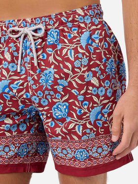 Gustavia burgundy swim shorts with floral print