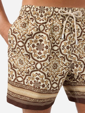 Gustavia swim shorts with brown ornamental placed print