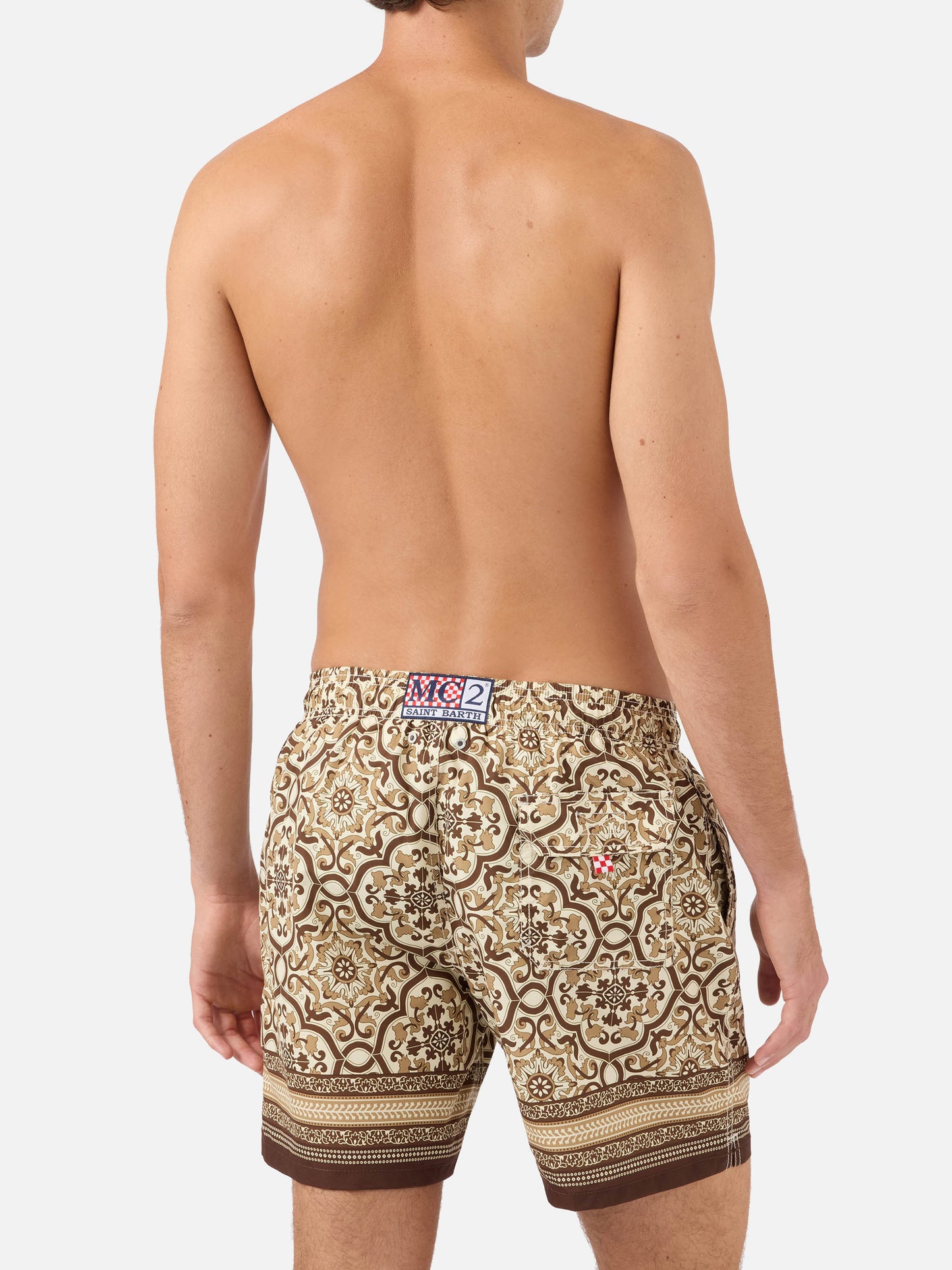 Gustavia swim shorts with brown ornamental placed print