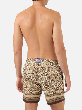 Gustavia swim shorts with brown ornamental placed print