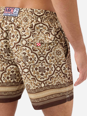 Gustavia swim shorts with brown ornamental placed print