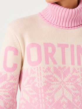 Maglia dolcevita New Hut rosa con stampa Cortina