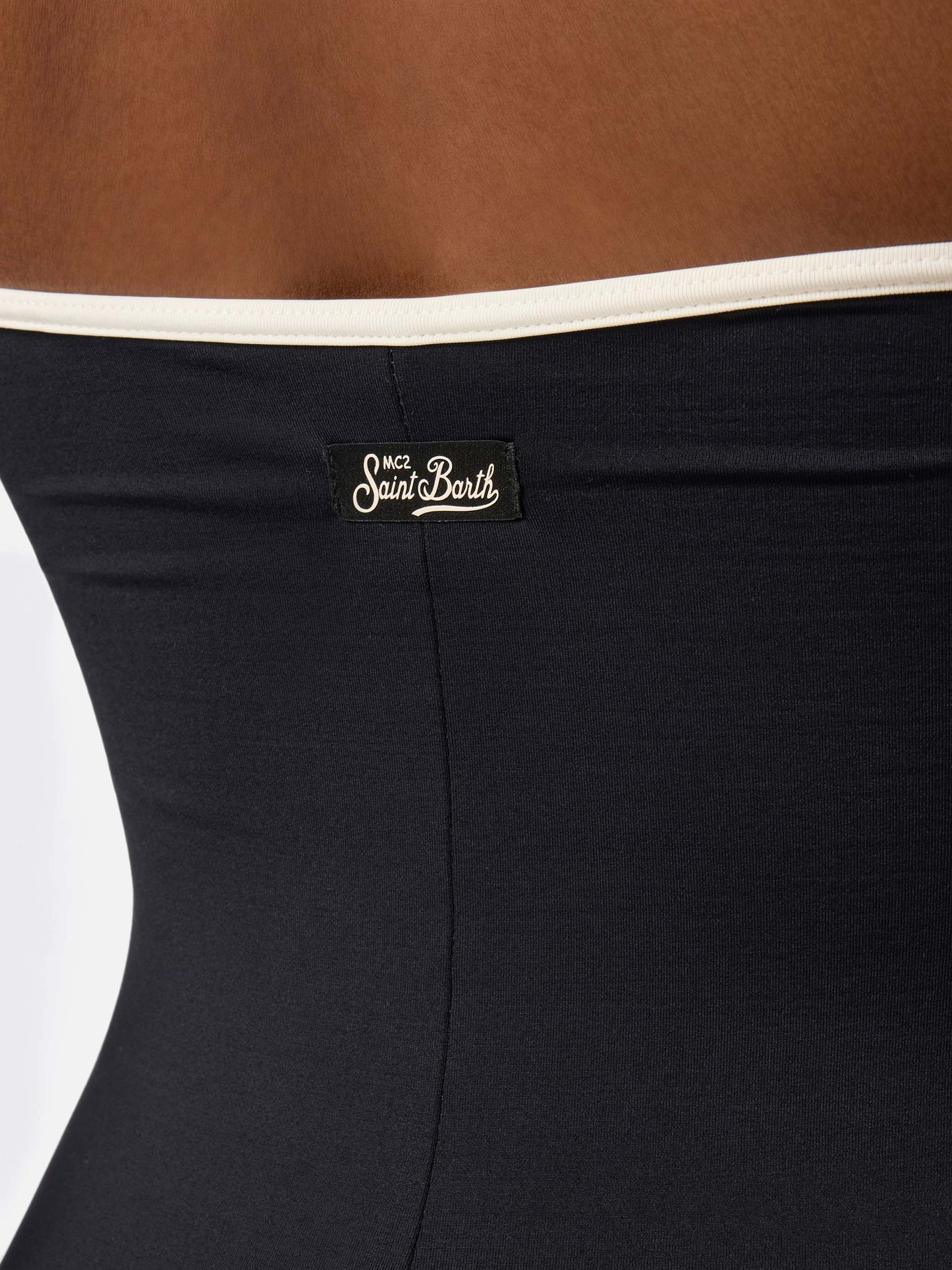 Khyra String bandeau black one-piece swimsuit with contrast details