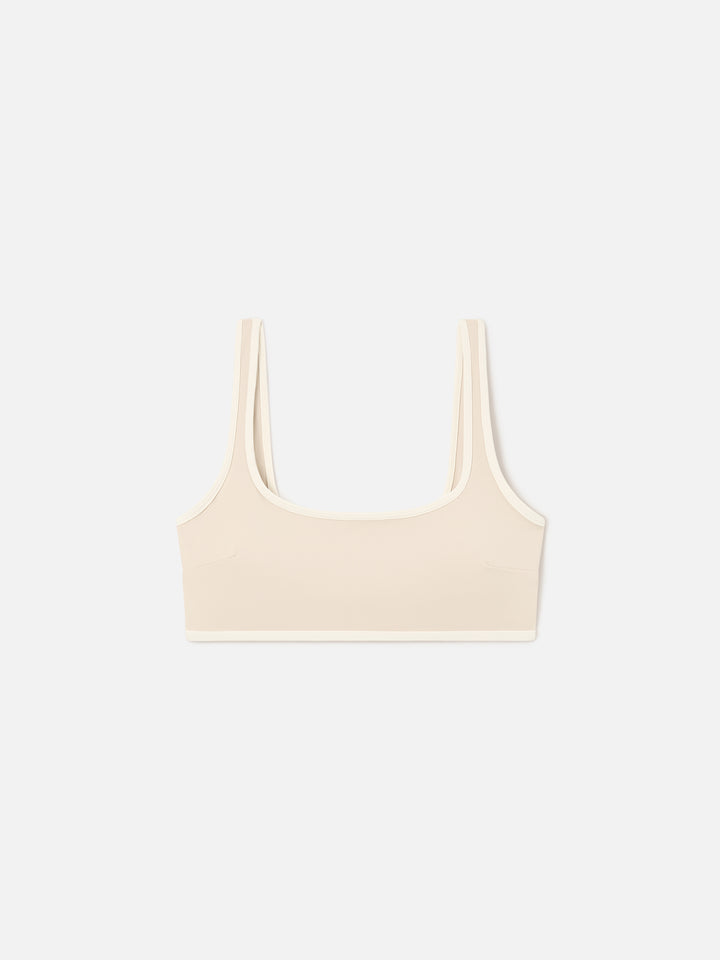 Top fitness Kassie beige con bordi a contrasto