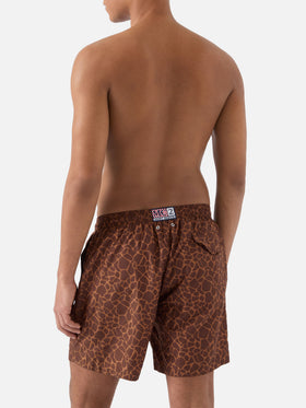 Brown Lighting swim shorts with all-over animal print