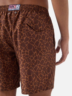 Brown Lighting swim shorts with all-over animal print