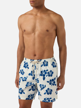 White Lighting swim shorts with all-over hibiscus print