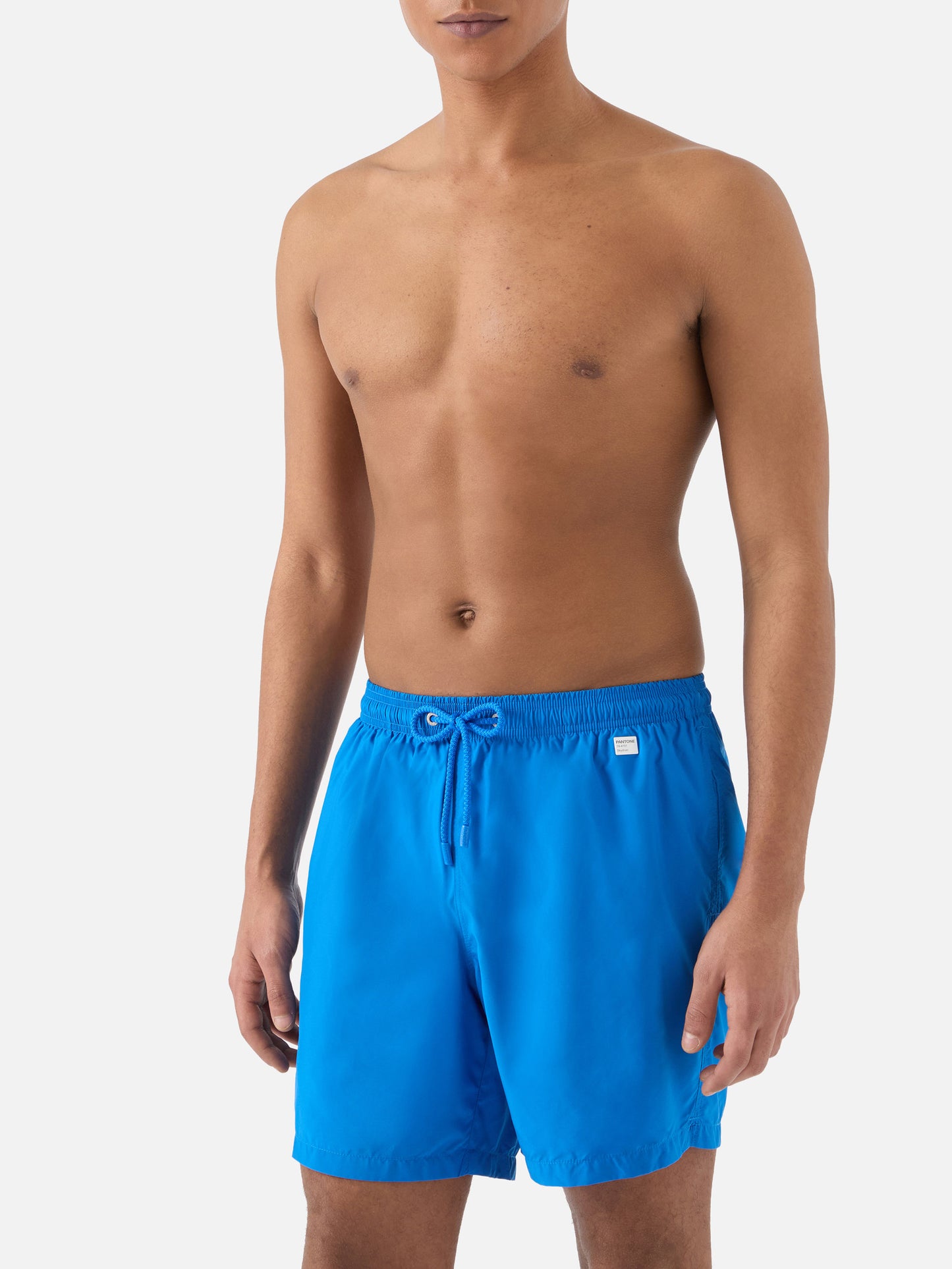 Lighting Pantone swim shorts in solid bright blue | Special Edition