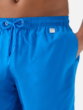 Lighting Pantone swim shorts in solid bright blue | Special Edition