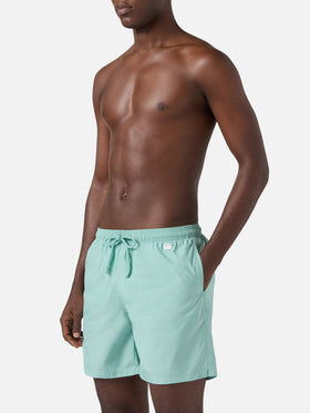 Lighting Pantone swim shorts in solid aqua green | Special Edition