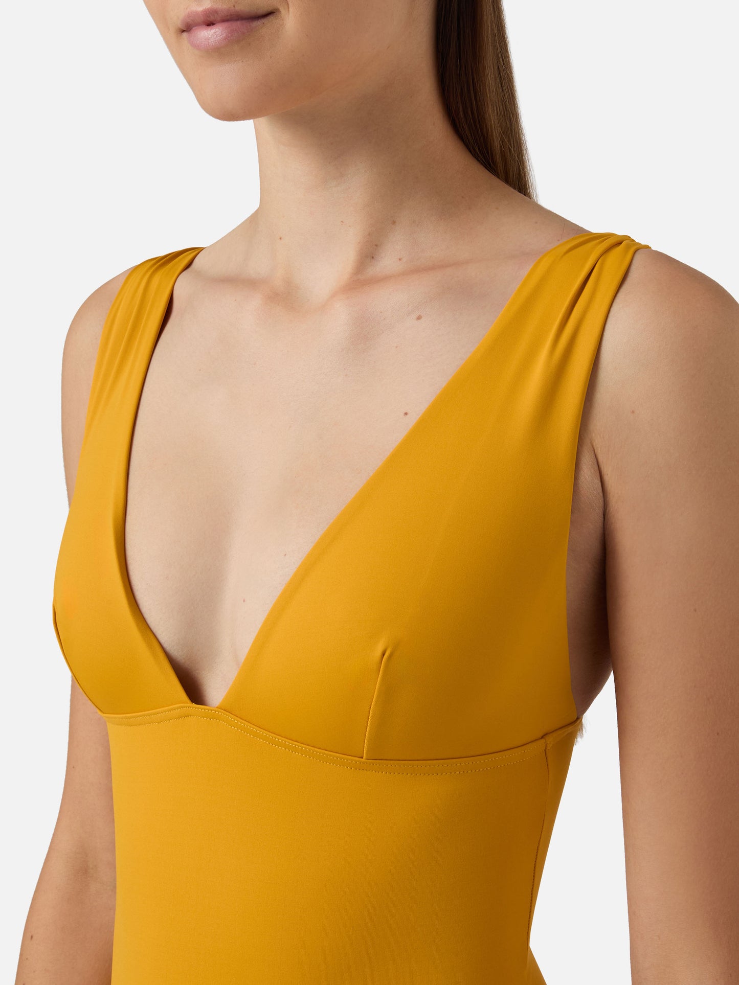 Mavi one-piece swimsuit with deep V neckline in solid ochre