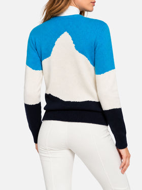 Light blue New Queen crewneck sweater with Engadina postcard jacquard