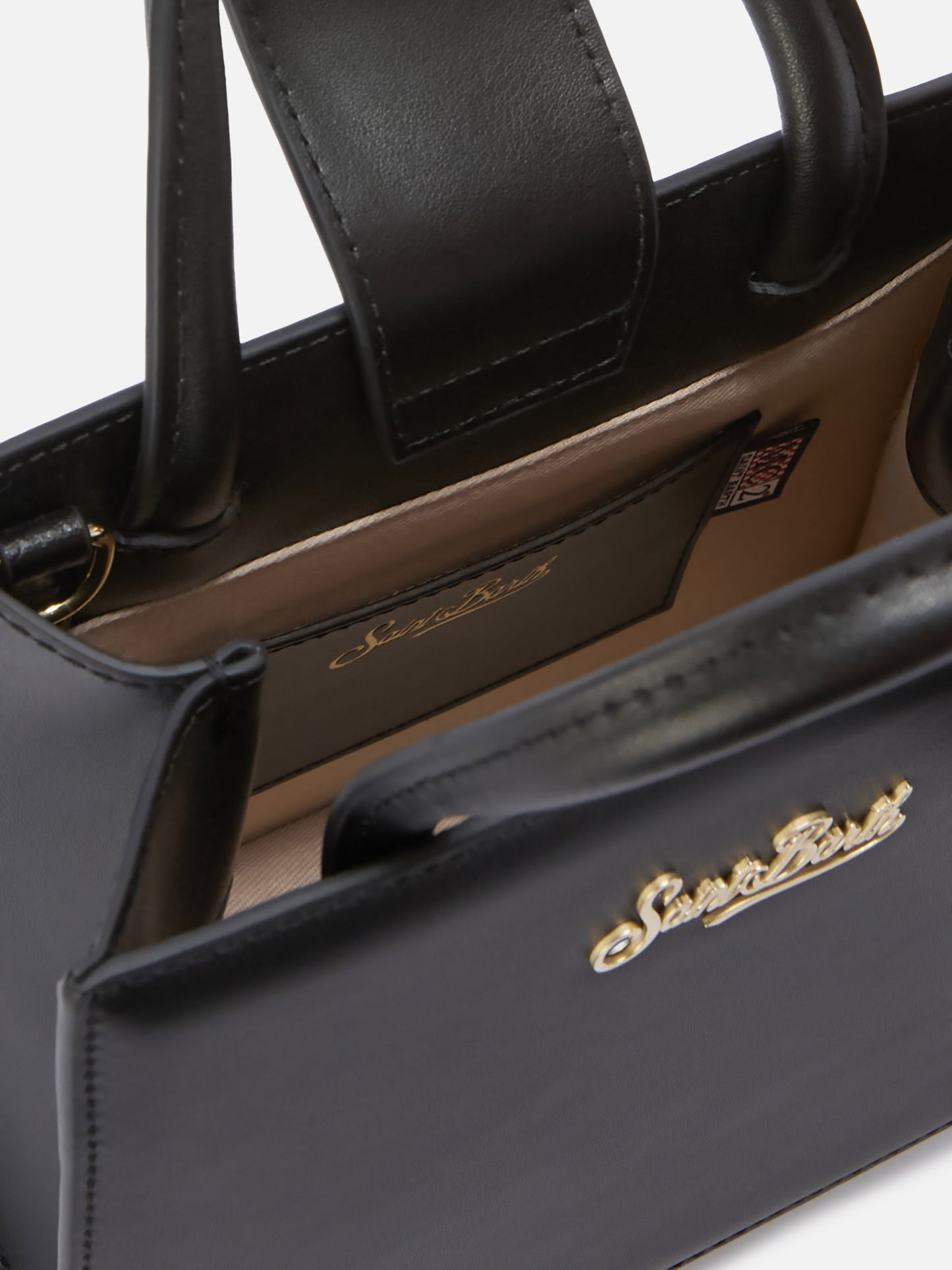 Structured Shop mini bag in black smooth leather with metal tag