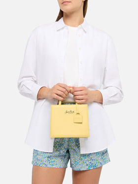 Structured Shop mini bag in butter yellow smooth leather with metal tag