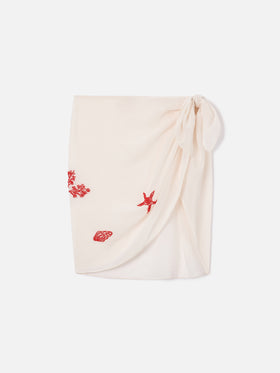Sery short pareo in cream with beaded sea-themed decorations