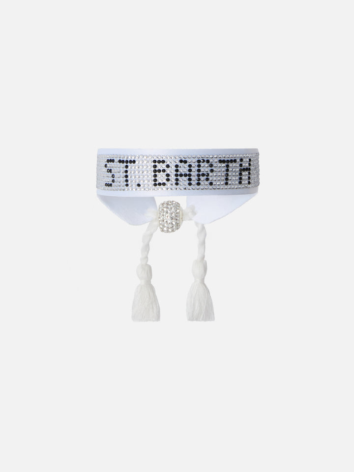 White fabric bracelet with St. Barth beaded lettering