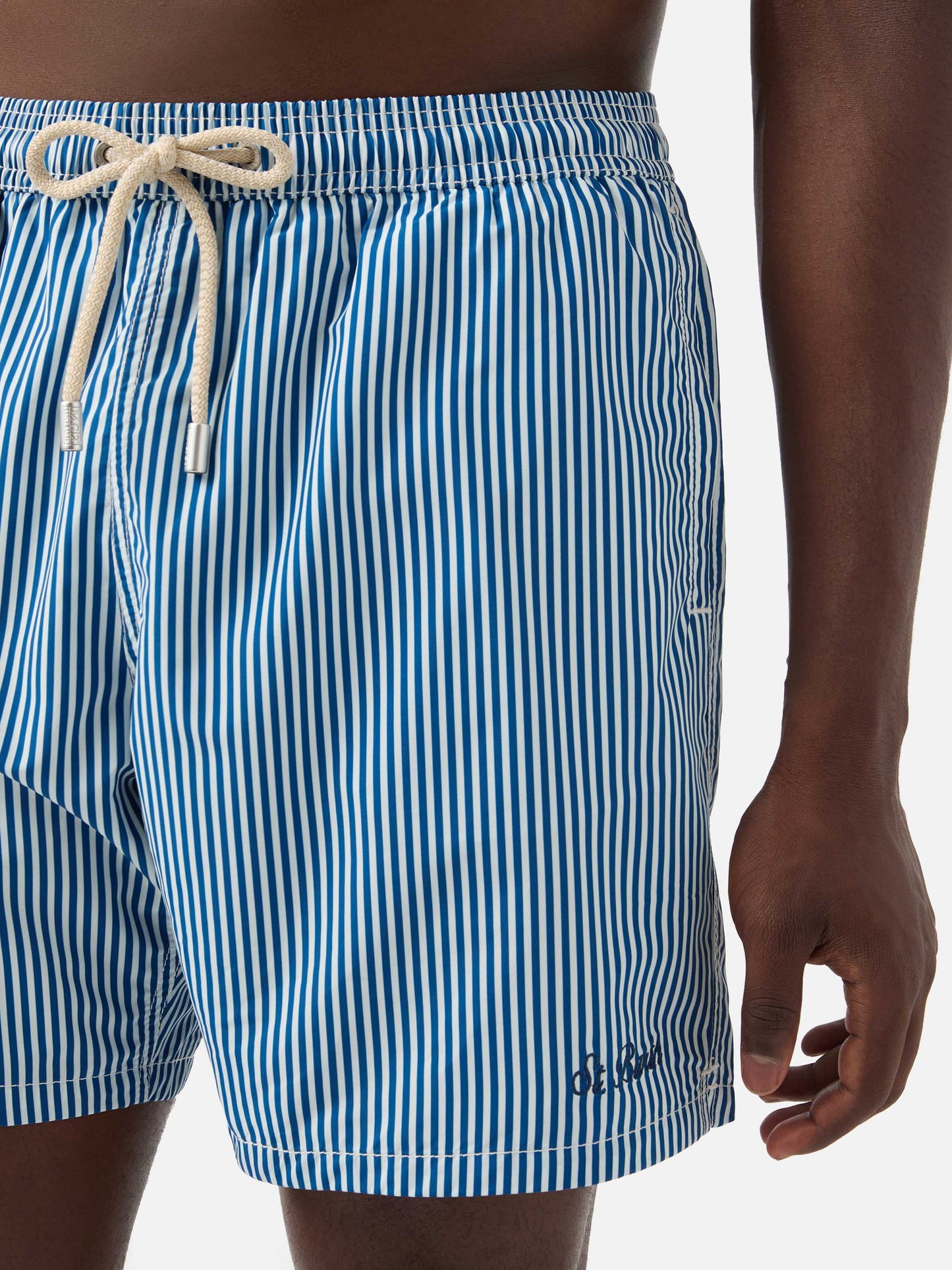 Syros swim shorts with white and blue striped pattern