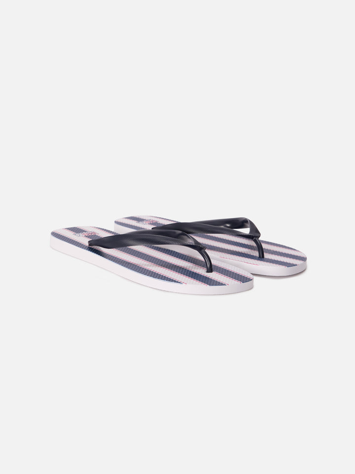 Tommy rubber slip-on flip flops with blue and white wide stripes