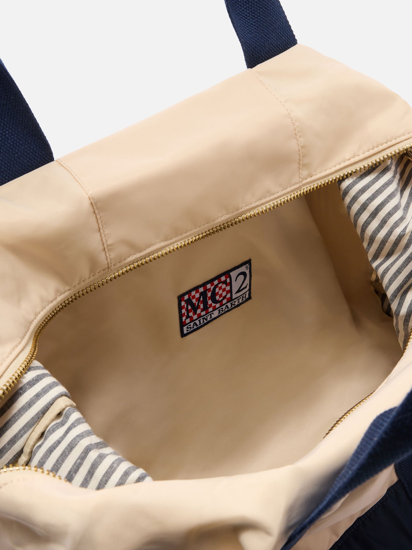 Borsone Travel Bag in nylon panna e blu con logo ricamato
