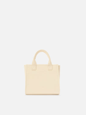 Bolso Vanity mediano de piel granulada color marfil 