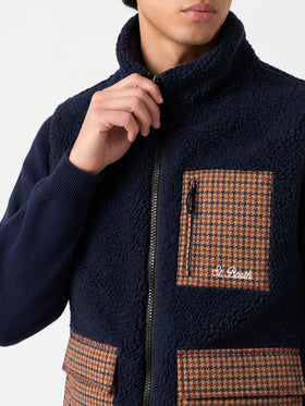Chaleco sherpa azul Wanaka con bolsillos de cuadros 