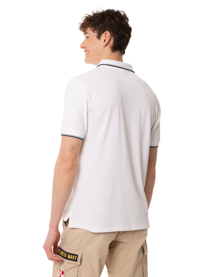 White piquet polo with St. Barth logo